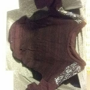 Smoking hot sweater with sparkly embellishments.